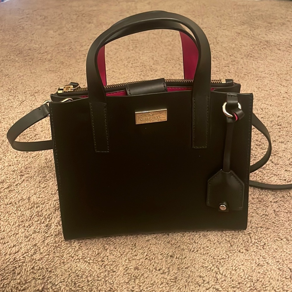 Kate Spade Black purse with pink inside